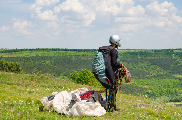 paraglider prepares to fly over the river Bakota - Photo, image