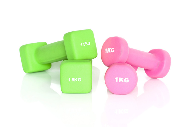Green and pink fitness dumbbells - Photo, Image