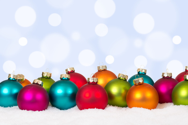 Christmas card many colorful balls with snow and copyspace - 写真・画像