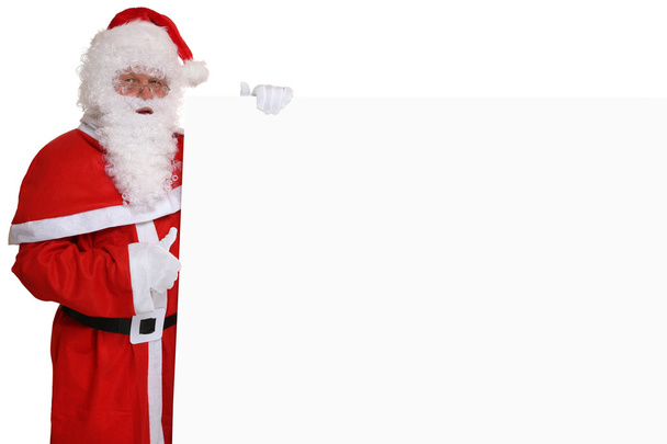Babbo Natale pollice in su sul Natale tenendo banner vuoto
 - Foto, immagini