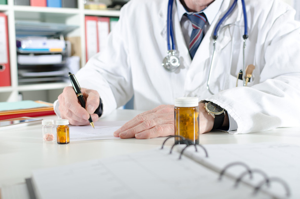 Doctor writing prescription - Photo, Image