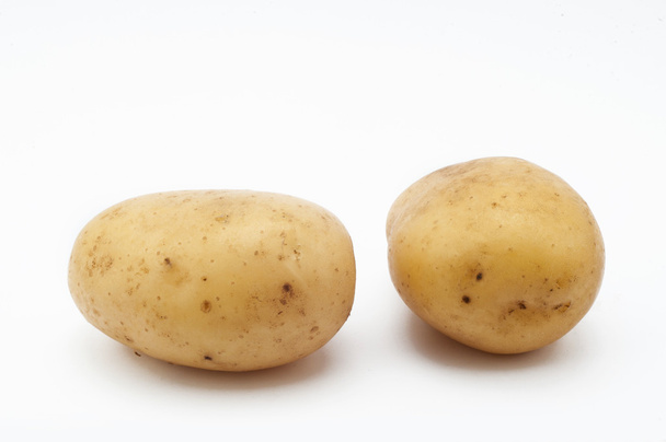 Качество картошки erou. Картофель на белом фоне
 - Фото, изображение