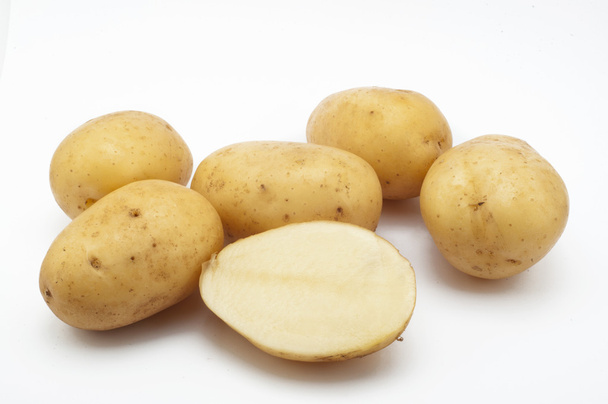 Quality of potatoes erou. Potatoes isolated on white background - Photo, image