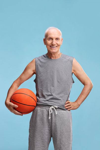 man in sportswear holding a basketball - Photo, image