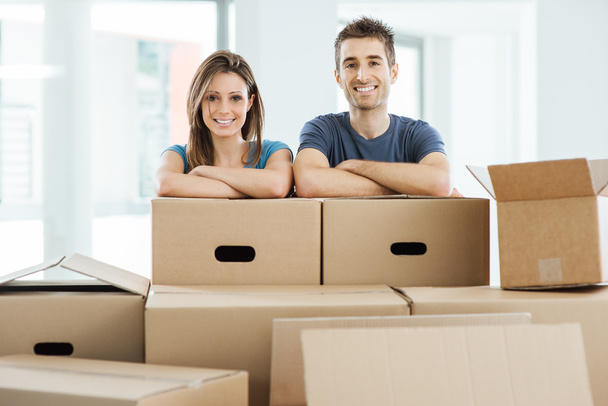 Young couple moving in their new home - Photo, image