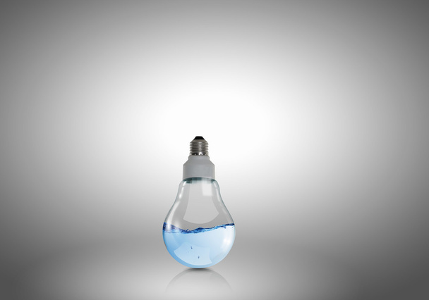 Light bulb with water - Φωτογραφία, εικόνα