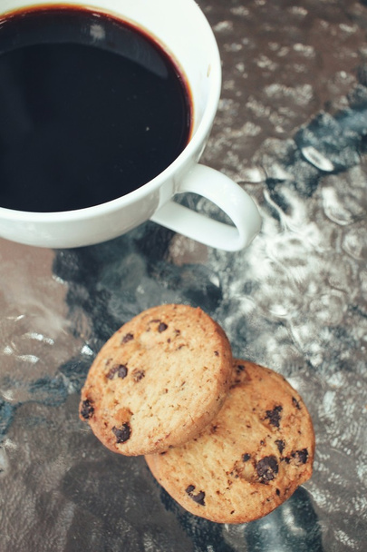 Гаряча кава з шоколадним печивом
 - Фото, зображення
