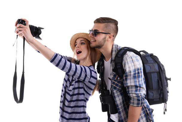 Pair of travelers with camera isolated on white - Φωτογραφία, εικόνα