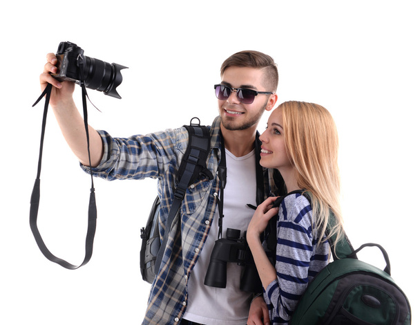 Pair of travelers with camera isolated on white - Foto, Imagen