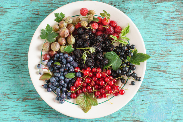fresh berries in plate - 写真・画像