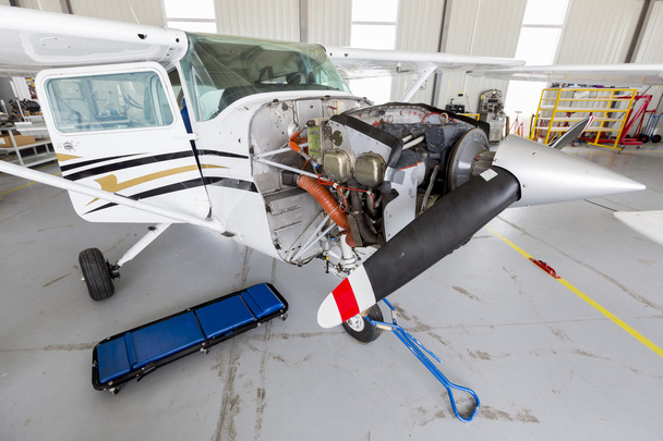Repairing small propeller airplane - Photo, image