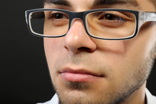Attractive young man with glasses close up - Zdjęcie, obraz