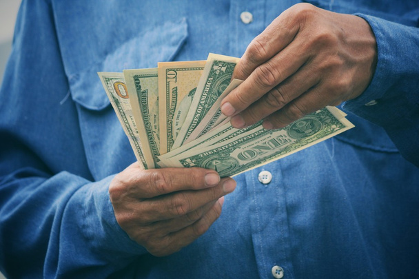 Senior man holding of dollars - Photo, Image