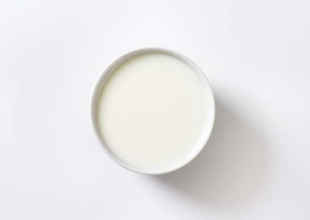 Bowl of fresh milk - Фото, изображение