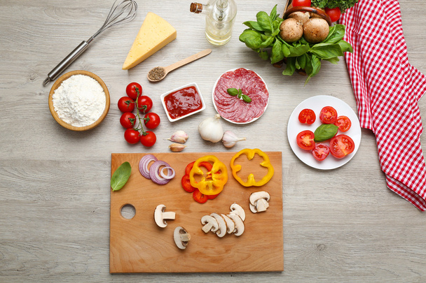 Food ingredients for pizza on table close up - Foto, Imagem