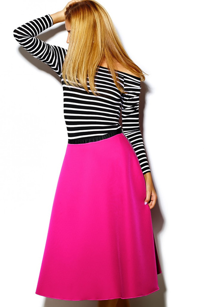 Funny crazy glamor stylish sexy smiling beautiful blond young woman model in pink hipster clothes in studio - 写真・画像