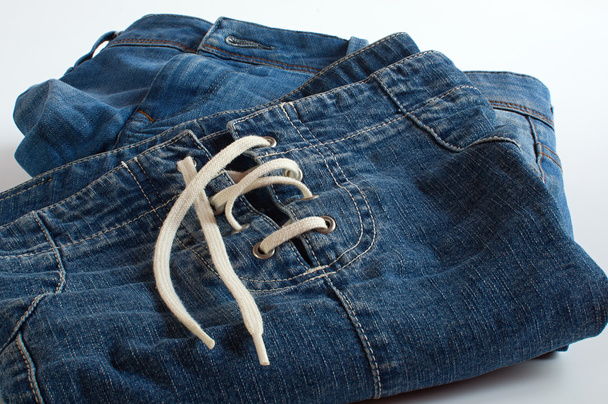 roupas jeans em branco
 - Foto, Imagem