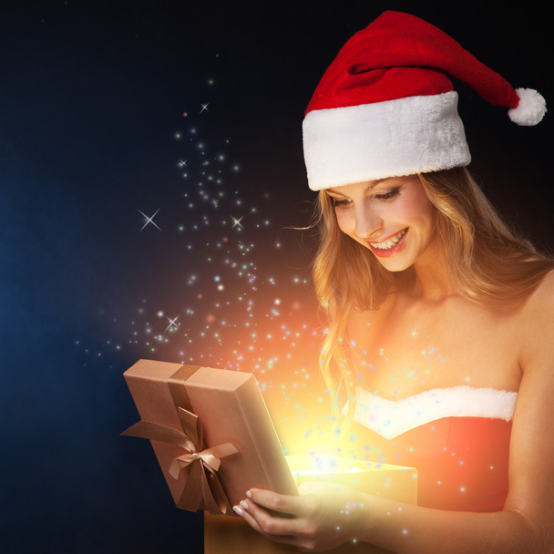 Beautiful christmas woman open fairy gift - Fotó, kép