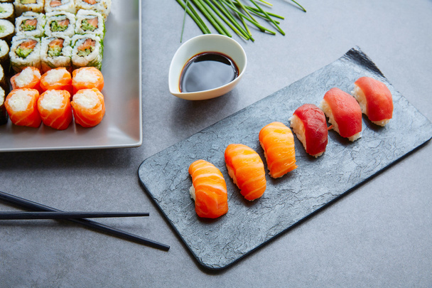 Sushi Maki and Niguiri with soy sauce California roll - Фото, зображення