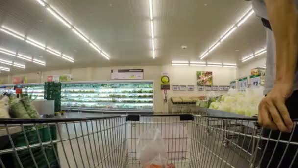 Shopping Cart in Supermarket. Time Lapse - Felvétel, videó