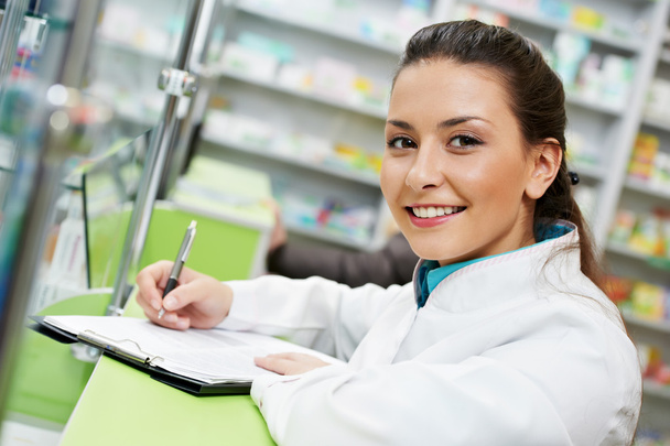 Pharmacy chemist woman in drugstore - 写真・画像