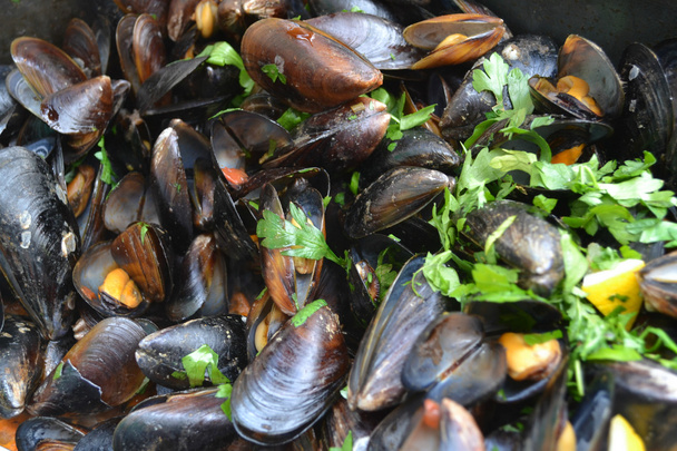 Tasty mussels cooked with parsley - Photo, Image