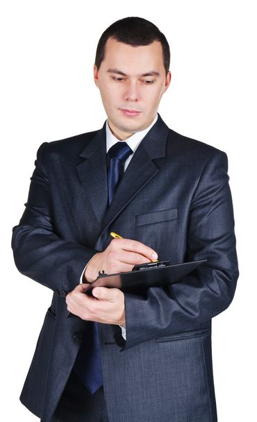 Portrait of businessman holding a blank board and a pen - Foto, Imagen