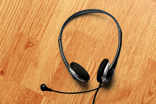 Чорний гарнітур навушників
 - Фото, зображення