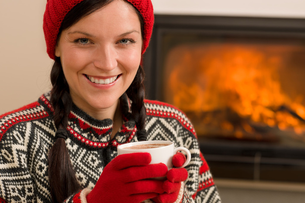 Fireplace winter christmas woman drink home - Valokuva, kuva