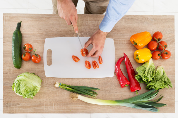 Male Hands Chopping Vegetables - Photo, Image