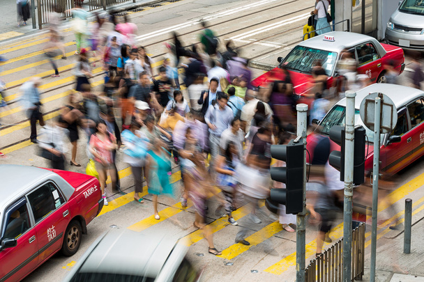 Cruce peatonal ocupado en Hong Kong
 - Foto, imagen