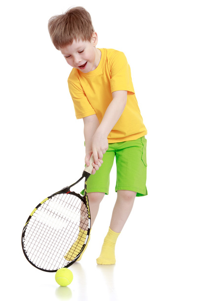 Boy playing tennis - Valokuva, kuva