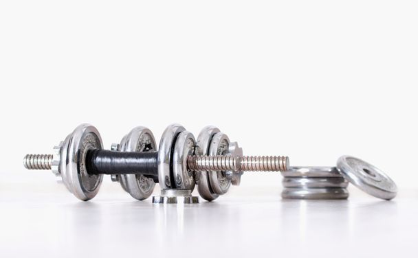 Dumbbells with extra weight plates - 写真・画像