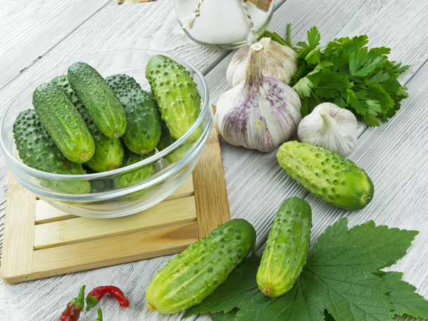 fresh cucumbers on a wooden table - Photo, Image