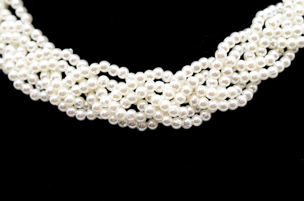 necklace of pearls isolated on black - Valokuva, kuva