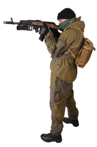 Insurgent wearing shemagh with kalashnikov rifle - Photo, image