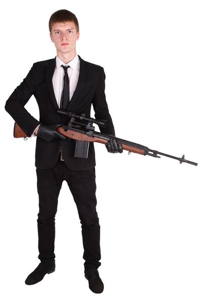 Man in suit with sniper rifle - Fotó, kép