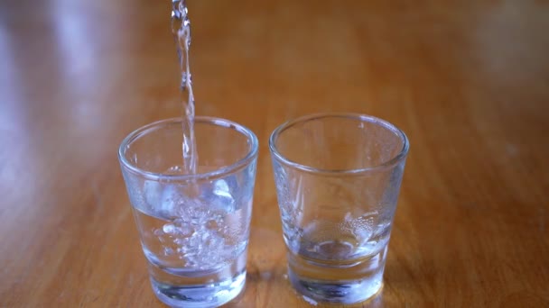Close-up of Vodka Poured into a Shot Glass - Záběry, video