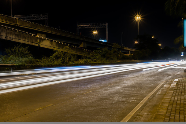 Speed Traffic at Night time - light trails on road, long exposur - Photo, Image