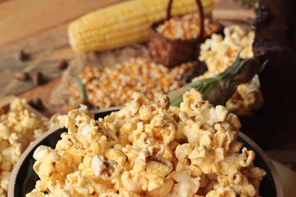 Popcorn and yellow dry corn grain with fresh corn. - Foto, immagini