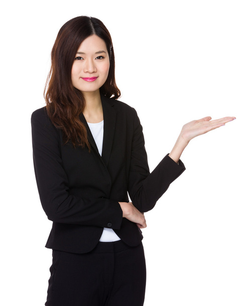 Businesswoman with open palm - Photo, Image