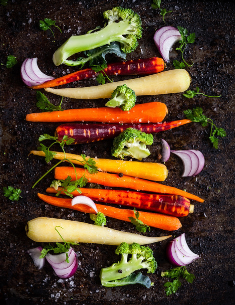 Raw rainbow carrot for roasting - Fotó, kép