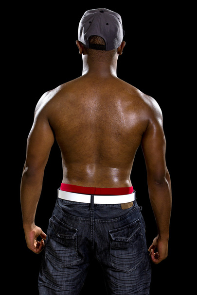 man flexing back muscles - Photo, Image