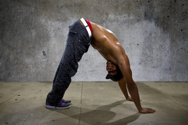 Man demonstrating core balance exercises - Fotoğraf, Görsel