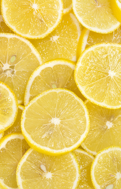 Sliced ripe lemons - Фото, зображення