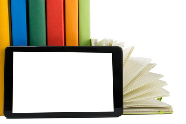 Куча разноцветных книг и электронный читатель книг. Возвращение в школу
 - Фото, изображение