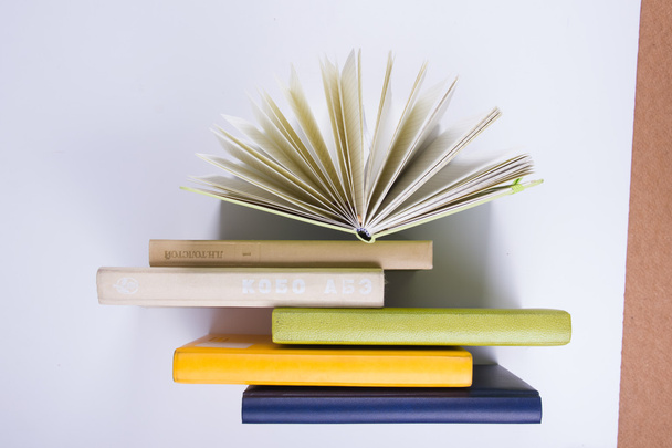 A stack of colorful books, open book. Back to school - Foto, Bild