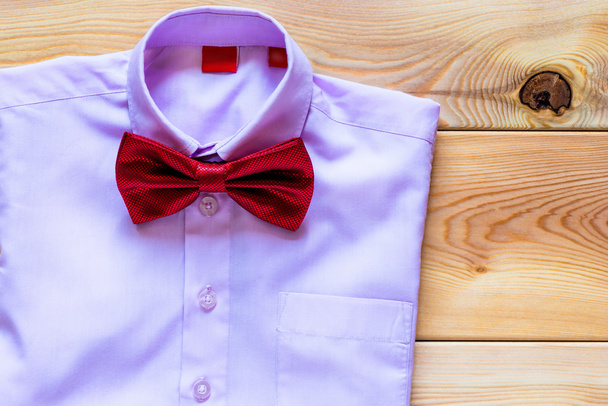 pink shirt and a beautiful bow tie - Photo, Image