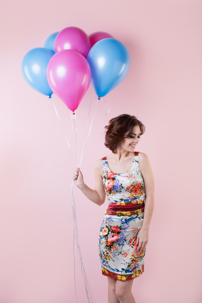 Woman with balloons - Фото, изображение