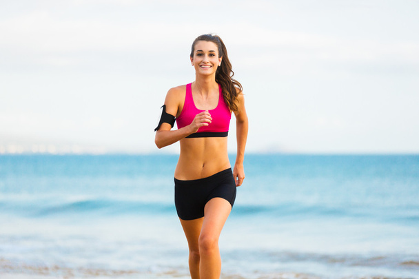 Sports Fitness Woman Running on the Beach - Fotó, kép